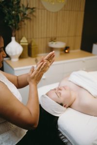 Woman receiving the Signature Nervous System Facial at Body Rituals Spa in Calgary.